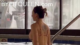 Young European girl indulges in pool and jacuzzi fun at hotel