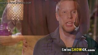 Topless swinger babes playing softcore sex games in outdoor setting