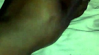 rubbing oil all over this ebony milf's big ass.