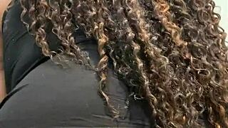 Chubby latina shows off big tits and ass in hotel bathroom