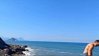 excited couple enjoys raw amateur sex on beach