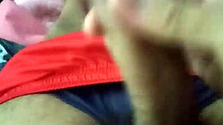 A relaxing handjob session on the bed