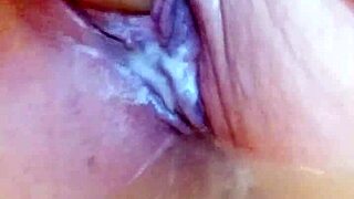 she says, watch me fuck my wet pussy with this dildo in the pool-like bathtub, creamy and solo.