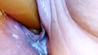 she says, watch me fuck my wet pussy with this dildo in the pool-like bathtub, creamy and solo.