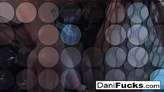 Dani Daniels teases her big tits while masturbating.