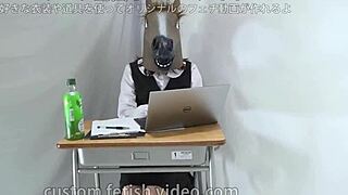 Female Office Worker Wearing Mask Engages In Fetish Activities At Work.
