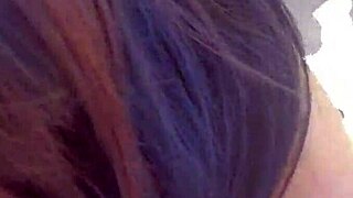 Asian slut JJ masturbates outdoors on a dam, wild act in serene spot