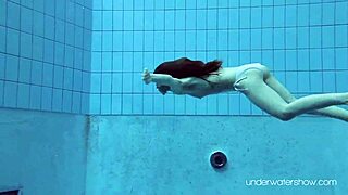 Sexy redhead roxalana cheh underwater