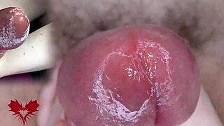 super close-up view of glans play with dilator in wild games.