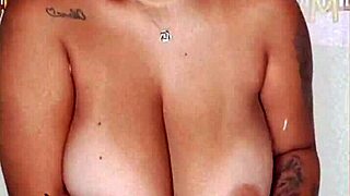 Brunette with big tits and ass shows off in shower