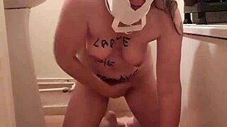Slave Trains Herself in Masked BDSM