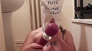 Slave Trains Herself in Masked BDSM