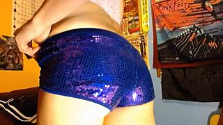 She slips on those tiny shorts, grabs the dildo toy, and starts TEASING with slow fondling moves. The package gets all the attention it craves.