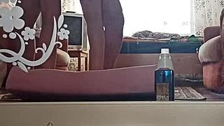 Kazakh couple films their home video together.