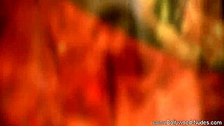 Eastern Indian dancer reveals her sensual moves in a solo performance. Her allure captivates every gaze.