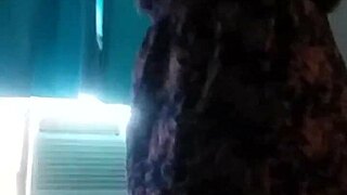 Young brunette teen undresses slowly in private