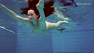 alla the russian brunette swims naked in the hot pool, her petite horny body smoking and glistening