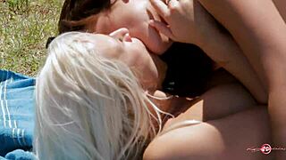 Hey, watch this blonde kiss a sexy brunette!