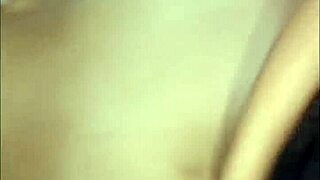 Maid relaxes inside the bedroom casually