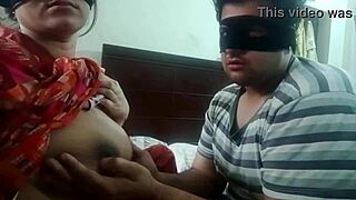 Hot couple kissing and sucking boobs