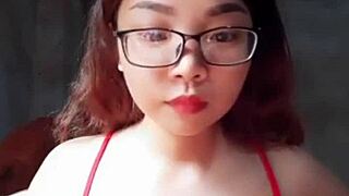 Em showcases big tits in a steamy display of raw action