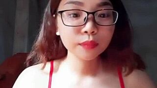 Em showcases big tits in a steamy display of raw action