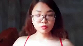 Em showcases big tits in a steamy display of raw action