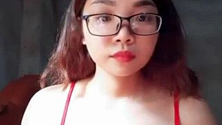 Em showcases big tits in a steamy display of raw action