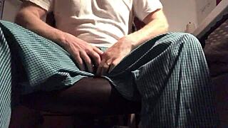 Stroking gay cock with intense bold passion