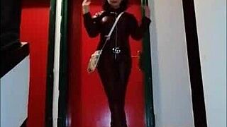 leather catsuit or pantyhose with miniskirt, femdom fetish vibes