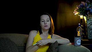 Brunette sucks on cigarette while voyeuristically looking at you