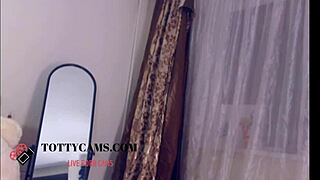 dark hair stunner shows off her big tits on cam