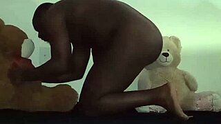 enjoying a threesome with brown and caucasian furry toy bears