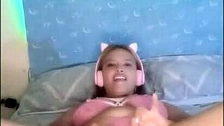 Curvy Gina gets wet doggystyle on bed during live transmission