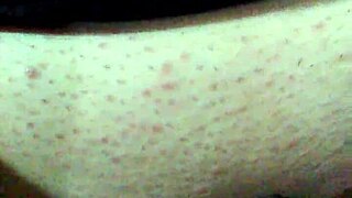 Bound Woman Uses Black Dildo While Masked