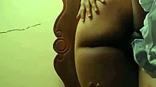 This girl with a big natural ass and tits is showing off her curves in a casual way