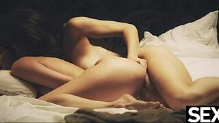 lesbian redhead gets her girlfriend's big natural tits bouncing with intense licking.