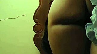 This girl with a big natural ass and tits is showing off her curves in a casual way