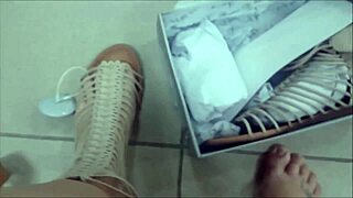 beautiful redhead tries sandals, flashes sexy feet