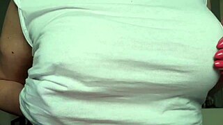 Busty MILF wets t-shirt without bra, reaching orgasm by playing with pierced nipples in solo amateur action. Her natural tits shine.