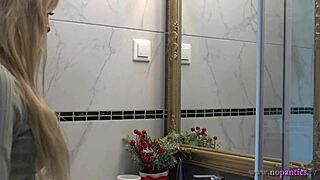 yo, check my sexy blonde wife changing panties in bathroom.