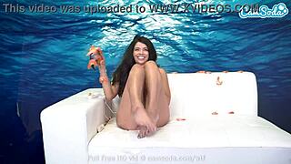 A brunette teen enjoys masturbating on webcam and gets an orgasm