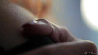 MetArt showcases redhead babe Michelle H undressing in a sensual solo display.