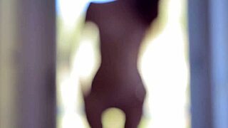 MetArt showcases redhead babe Michelle H undressing in a sensual solo display.