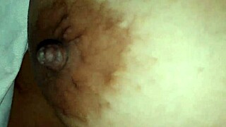 Squeezing Big Nipples Gently