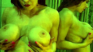 uhh, busty ginger flexin’ big muscles in mirror, so hot!