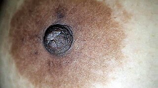 Squeezing Big Nipples Gently