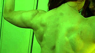 uhh, busty ginger flexin’ big muscles in mirror, so hot!