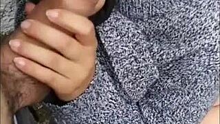 I's that brunette babe givin' a hot blowjob on the street, riskin' gettin' caught