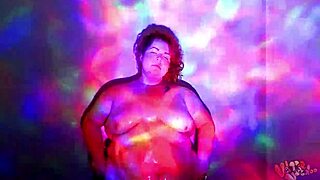bbw goddess dances naked with oil worship. her curves shine bright.